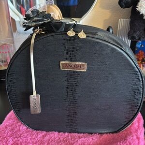 Lancome Paris Leather Train Case black animal print like Flather material. Gold